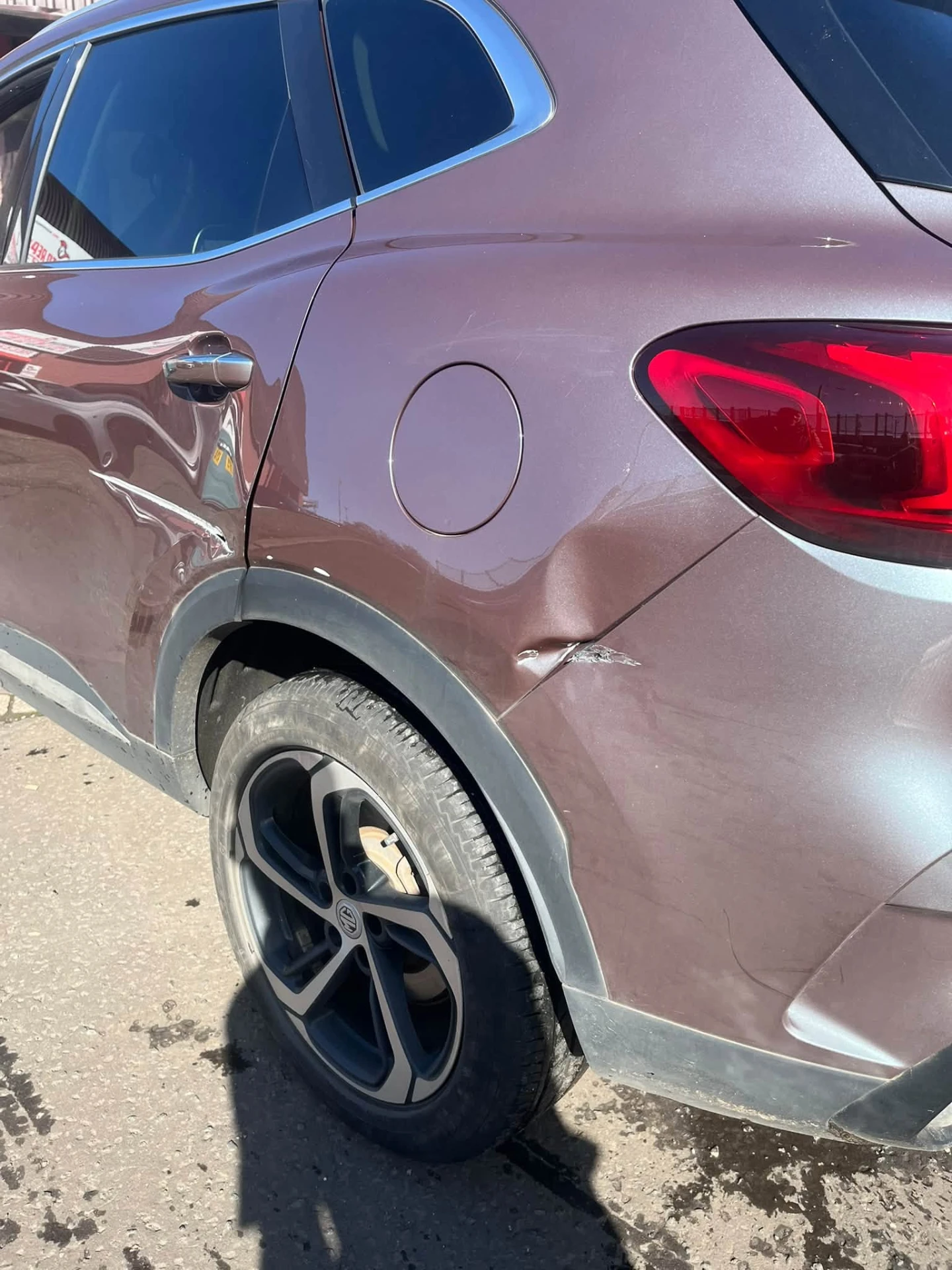 MG rear quarter panel dent repair – before repair